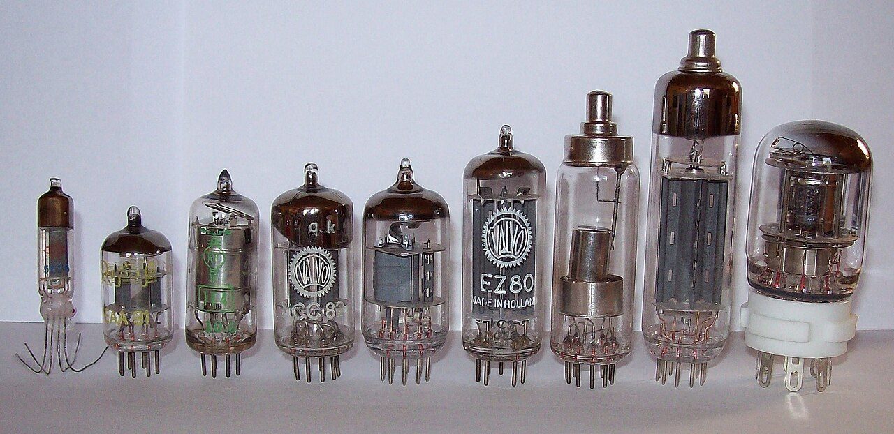 A row of glass vacuum tubes of different sizes