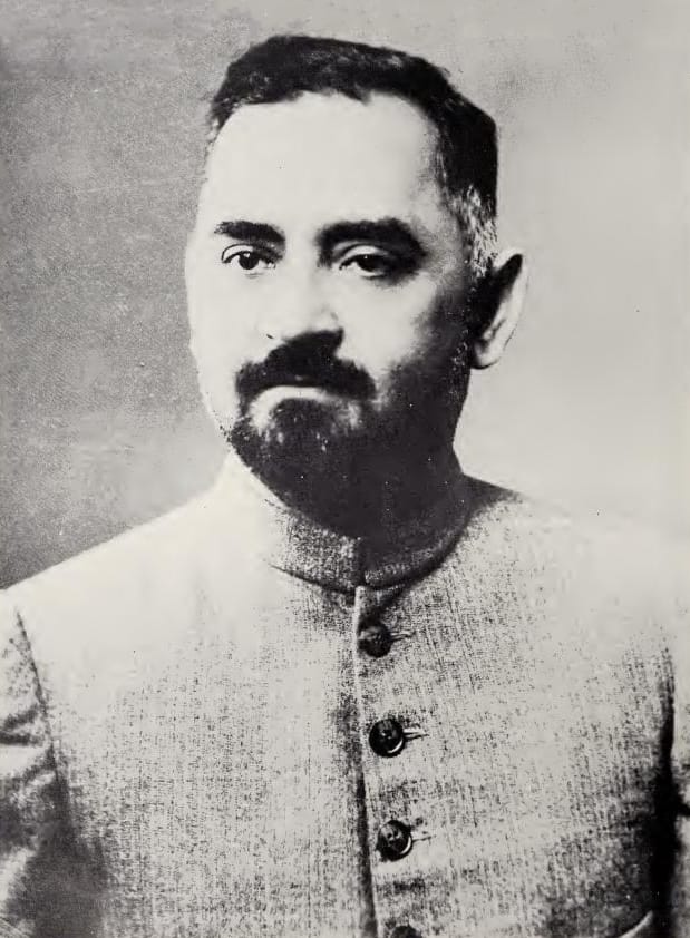 Black-and-white portrait of Zakir Husain