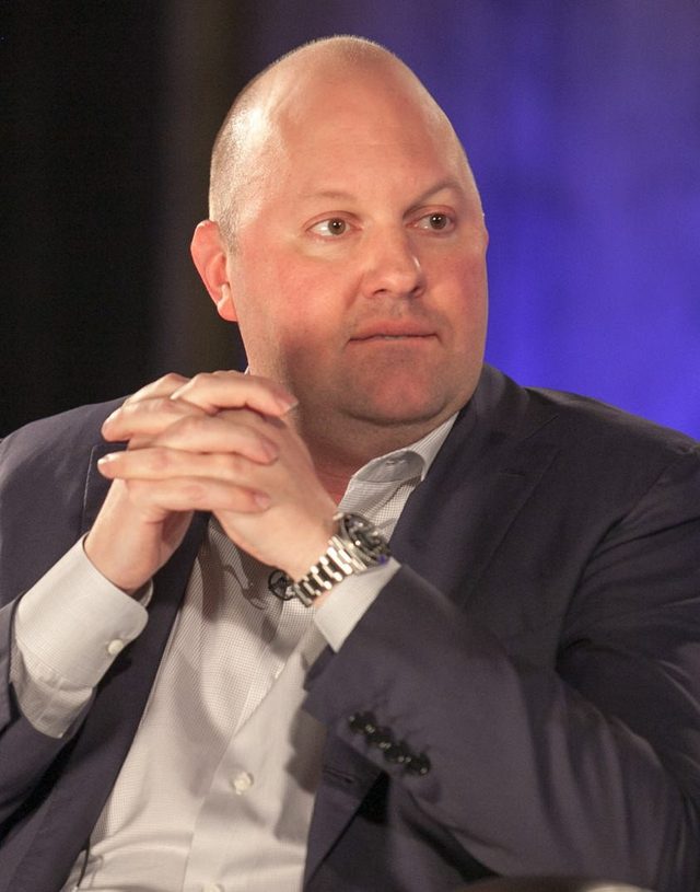 Marc Andreessen seated, speaking at an interview event