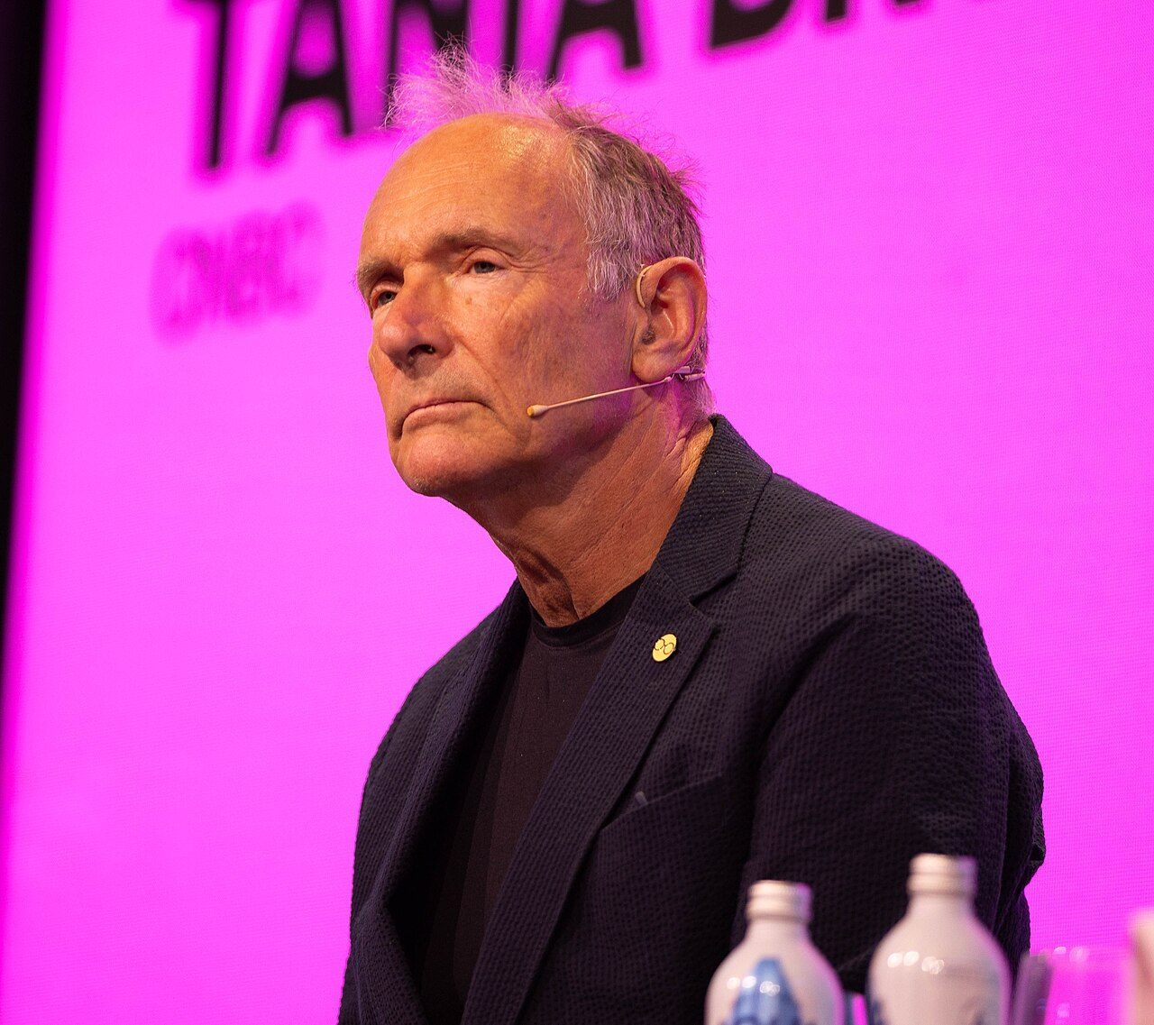 Tim Berners-Lee smiling, speaking on stage