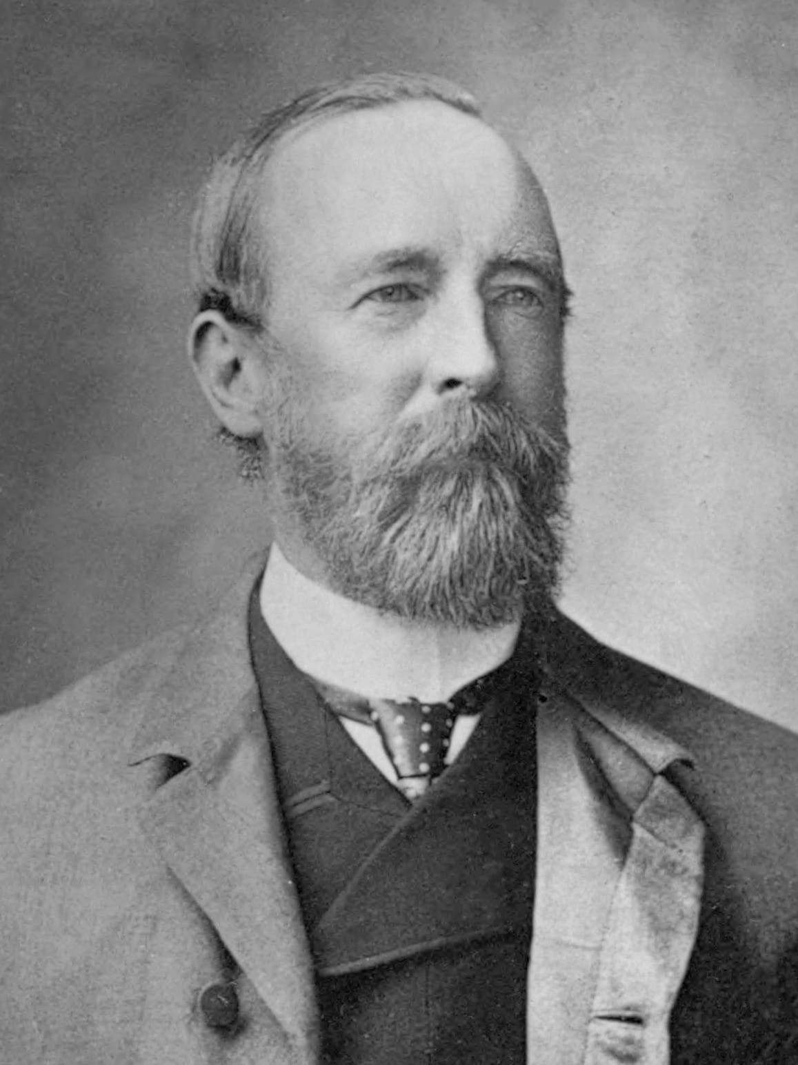 Old photograph of A. O. Hume, an elderly Englishman with a white beard