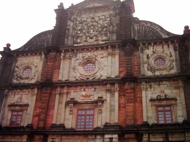 Front of the old red-brown Basilica of Bom Jesus church in Old Goa