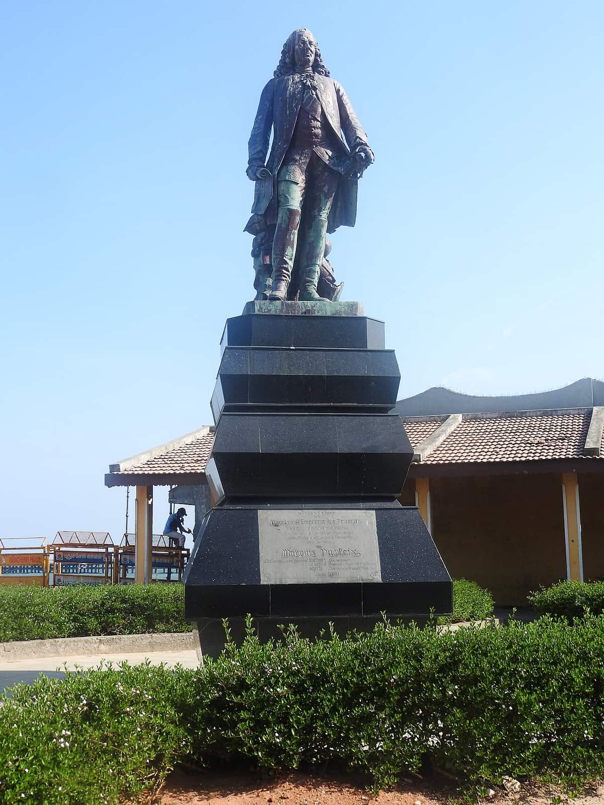 Stone statue of Joseph François Dupleix on a pedestal in Pondicherry
