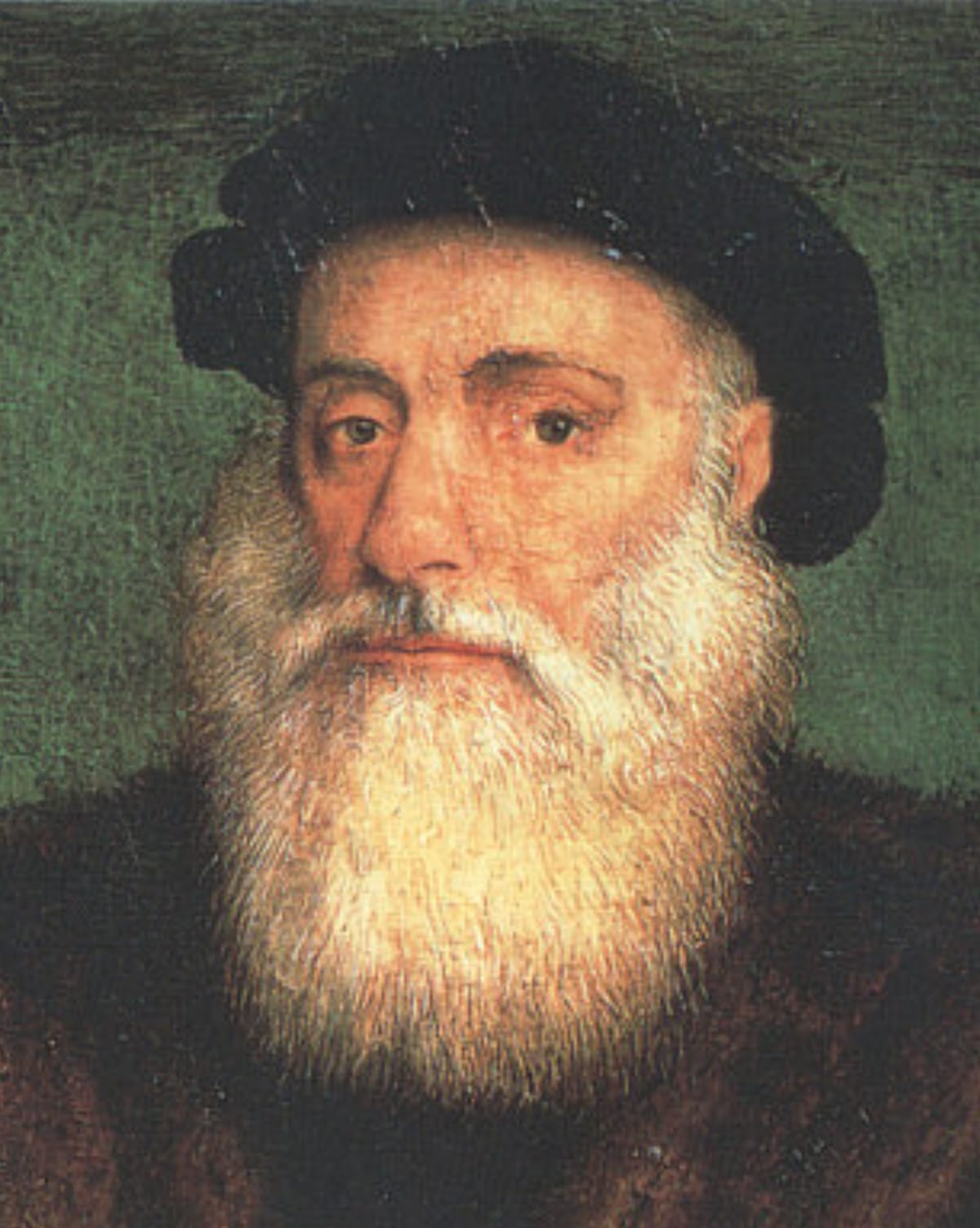 Old portrait of Vasco da Gama with a long white beard and dark cap