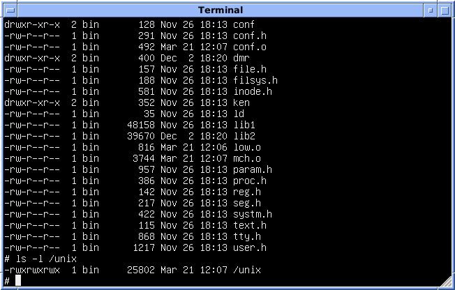A black terminal window with white text: typed Unix commands and a list of files