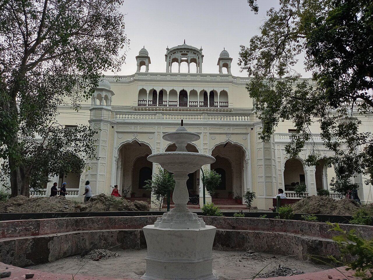 White palace building with a fountain in Banasar Bagh, Sangrur