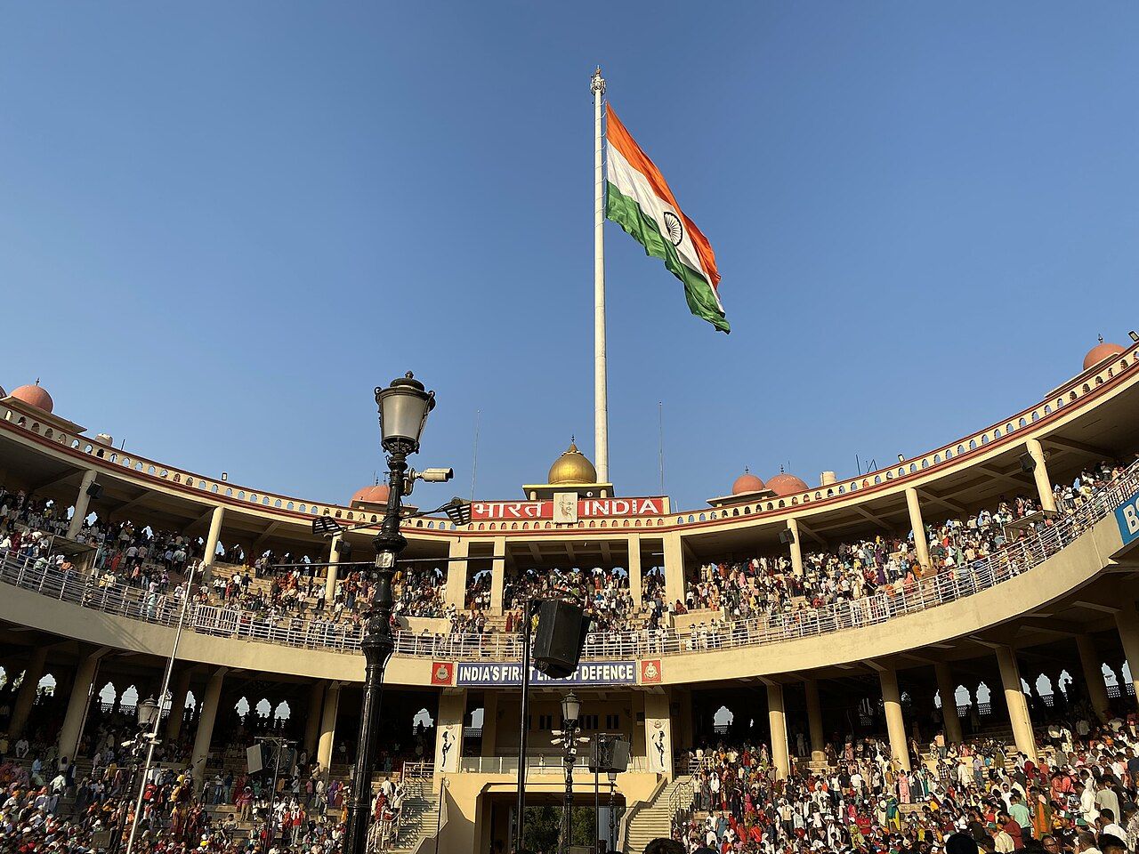 The Indian gallery at the Attari–Wagah border with a large Indian flag and crowds
