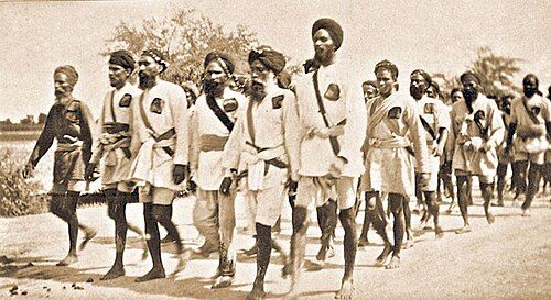 1922 ਵਿੱਚ ਮਾਰਚ ਕਰਦੇ ਅਕਾਲੀ ਸਵੈ-ਸੇਵਕਾਂ ਦੇ ਜਥੇ ਦੀ ਪੁਰਾਣੀ ਤਸਵੀਰ