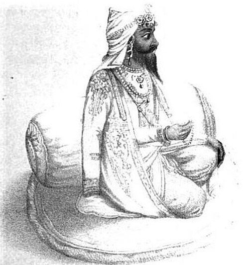 Lithograph of Maharaja Kharak Singh seated against a bolster, holding prayer beads