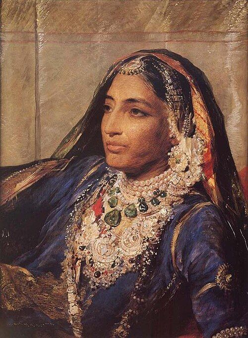 Painting of Maharani Jind Kaur in jewels and a dark blue dress