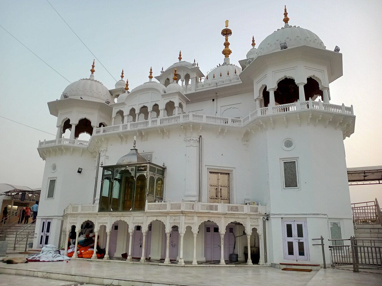 The white domed building of Takht Sri Kesgarh Sahib with arched verandas