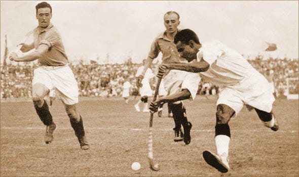 Dhyan Chand with the ball at the 1936 Berlin Olympics