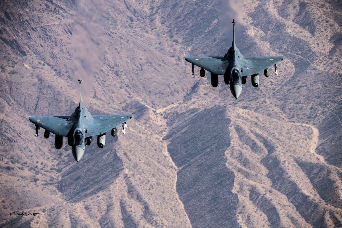 Two HAL Tejas fighter aircraft flying in formation